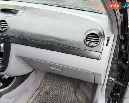 Черный Шевроле Лачетти, объемом двигателя 1.8 л и пробегом 202 тыс. км за 3999 $, фото 26 на Automoto.ua