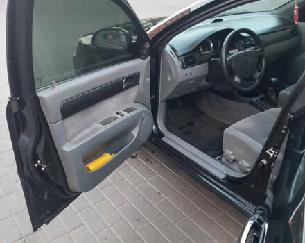 Черный Шевроле Лачетти, объемом двигателя 1.8 л и пробегом 202 тыс. км за 4999 $, фото 15 на Automoto.ua