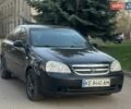 Черный Шевроле Лачетти, объемом двигателя 1.8 л и пробегом 265 тыс. км за 4450 $, фото 1 на Automoto.ua