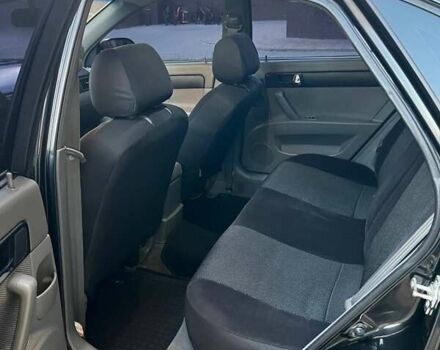 Черный Шевроле Лачетти, объемом двигателя 1.8 л и пробегом 131 тыс. км за 6400 $, фото 51 на Automoto.ua