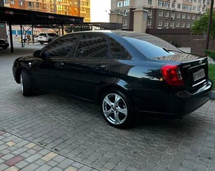 Черный Шевроле Лачетти, объемом двигателя 1.8 л и пробегом 131 тыс. км за 6400 $, фото 21 на Automoto.ua