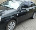 Черный Шевроле Лачетти, объемом двигателя 1.8 л и пробегом 230 тыс. км за 4200 $, фото 1 на Automoto.ua