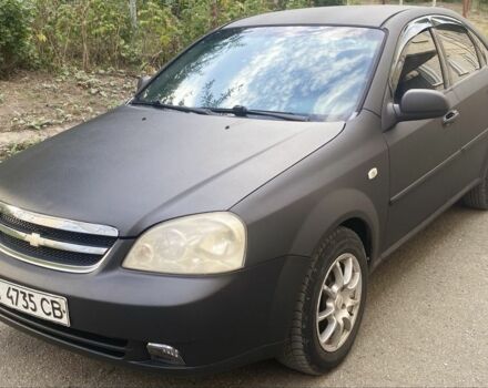 Черный Шевроле Лачетти, объемом двигателя 1.6 л и пробегом 302 тыс. км за 3750 $, фото 7 на Automoto.ua