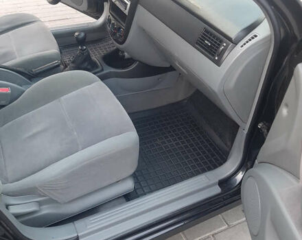 Черный Шевроле Лачетти, объемом двигателя 1.8 л и пробегом 202 тыс. км за 4999 $, фото 22 на Automoto.ua