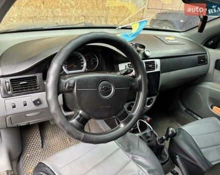 Черный Шевроле Лачетти, объемом двигателя 1.6 л и пробегом 230 тыс. км за 3900 $, фото 4 на Automoto.ua