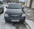 Черный Шевроле Лачетти, объемом двигателя 1.6 л и пробегом 235 тыс. км за 4300 $, фото 1 на Automoto.ua