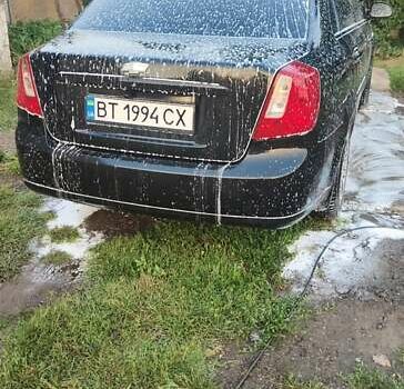 Черный Шевроле Лачетти, объемом двигателя 1.6 л и пробегом 230 тыс. км за 3900 $, фото 8 на Automoto.ua