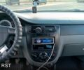 Черный Шевроле Лачетти, объемом двигателя 1.8 л и пробегом 200 тыс. км за 4500 $, фото 5 на Automoto.ua