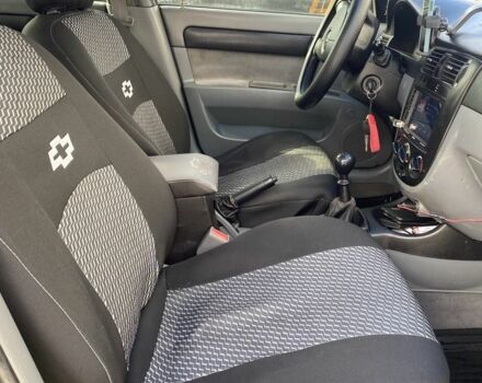 Черный Шевроле Лачетти, объемом двигателя 1.6 л и пробегом 302 тыс. км за 3750 $, фото 2 на Automoto.ua