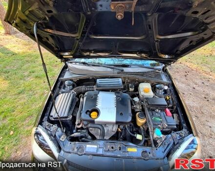 Черный Шевроле Лачетти, объемом двигателя 1.8 л и пробегом 180 тыс. км за 5300 $, фото 8 на Automoto.ua