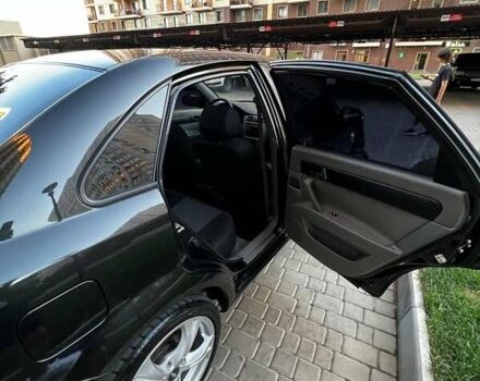 Черный Шевроле Лачетти, объемом двигателя 1.8 л и пробегом 131 тыс. км за 6400 $, фото 54 на Automoto.ua