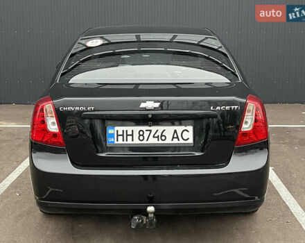 Черный Шевроле Лачетти, объемом двигателя 1.8 л и пробегом 170 тыс. км за 4400 $, фото 3 на Automoto.ua