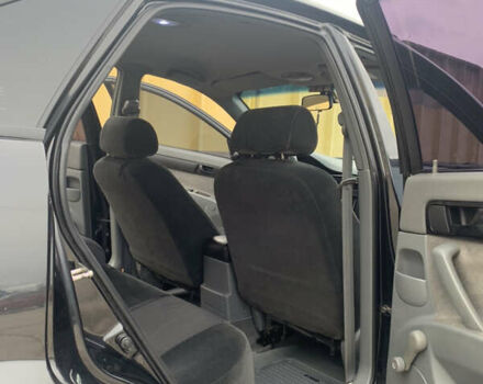 Черный Шевроле Лачетти, объемом двигателя 1.6 л и пробегом 174 тыс. км за 5500 $, фото 30 на Automoto.ua