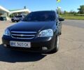 Черный Шевроле Лачетти, объемом двигателя 1.8 л и пробегом 145 тыс. км за 4800 $, фото 1 на Automoto.ua