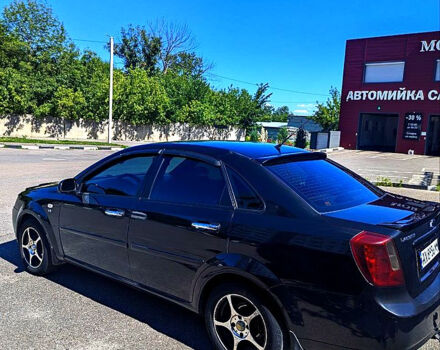 Черный Шевроле Лачетти, объемом двигателя 1.8 л и пробегом 318 тыс. км за 3800 $, фото 3 на Automoto.ua