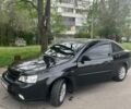 Черный Шевроле Лачетти, объемом двигателя 1.8 л и пробегом 210 тыс. км за 6000 $, фото 1 на Automoto.ua