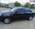Черный Шевроле Лачетти, объемом двигателя 1.8 л и пробегом 215 тыс. км за 4600 $, фото 1 на Automoto.ua