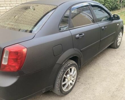 Черный Шевроле Лачетти, объемом двигателя 1.6 л и пробегом 302 тыс. км за 3750 $, фото 4 на Automoto.ua