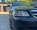 Черный Шевроле Лачетти, объемом двигателя 1.6 л и пробегом 200 тыс. км за 3700 $, фото 1 на Automoto.ua