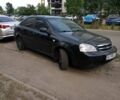 Черный Шевроле Лачетти, объемом двигателя 1.6 л и пробегом 303 тыс. км за 4150 $, фото 1 на Automoto.ua