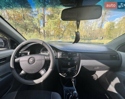 Черный Шевроле Лачетти, объемом двигателя 1.8 л и пробегом 251 тыс. км за 3900 $, фото 11 на Automoto.ua