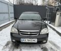 Черный Шевроле Лачетти, объемом двигателя 1.8 л и пробегом 235 тыс. км за 3300 $, фото 1 на Automoto.ua