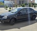 Черный Шевроле Лачетти, объемом двигателя 1.8 л и пробегом 250 тыс. км за 4899 $, фото 1 на Automoto.ua