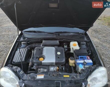 Черный Шевроле Лачетти, объемом двигателя 1.8 л и пробегом 244 тыс. км за 4200 $, фото 17 на Automoto.ua