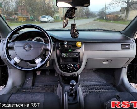 Черный Шевроле Лачетти, объемом двигателя 1.8 л и пробегом 244 тыс. км за 4200 $, фото 11 на Automoto.ua