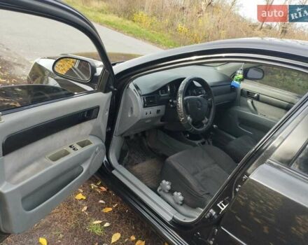 Черный Шевроле Лачетти, объемом двигателя 1.6 л и пробегом 190 тыс. км за 3700 $, фото 2 на Automoto.ua