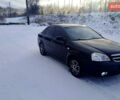 Черный Шевроле Лачетти, объемом двигателя 1.6 л и пробегом 150 тыс. км за 2700 $, фото 1 на Automoto.ua
