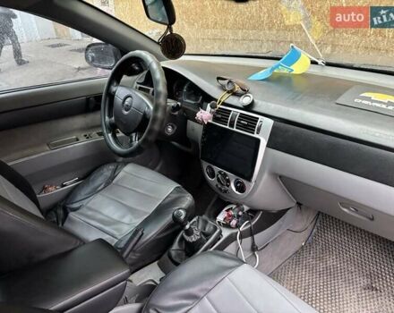 Черный Шевроле Лачетти, объемом двигателя 1.6 л и пробегом 230 тыс. км за 3900 $, фото 1 на Automoto.ua