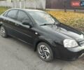Черный Шевроле Лачетти, объемом двигателя 1.6 л и пробегом 190 тыс. км за 3700 $, фото 5 на Automoto.ua