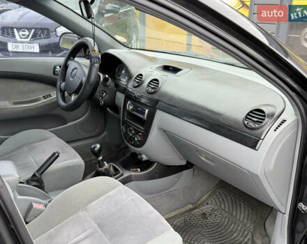 Черный Шевроле Лачетти, объемом двигателя 1.8 л и пробегом 202 тыс. км за 3999 $, фото 27 на Automoto.ua