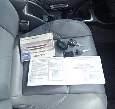 Черный Шевроле Лачетти, объемом двигателя 1.6 л и пробегом 156 тыс. км за 6100 $, фото 15 на Automoto.ua