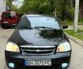 Черный Шевроле Лачетти, объемом двигателя 1.8 л и пробегом 155 тыс. км за 4400 $, фото 1 на Automoto.ua