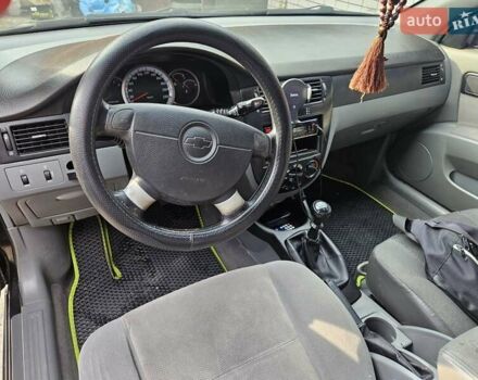 Чорний Шевроле Лачетті, об'ємом двигуна 1.8 л та пробігом 215 тис. км за 4600 $, фото 5 на Automoto.ua