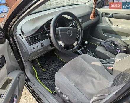 Чорний Шевроле Лачетті, об'ємом двигуна 1.8 л та пробігом 215 тис. км за 4600 $, фото 3 на Automoto.ua