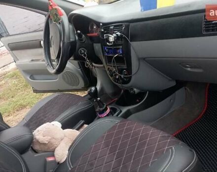 Чорний Шевроле Лачетті, об'ємом двигуна 1.8 л та пробігом 215 тис. км за 5200 $, фото 4 на Automoto.ua