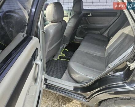 Чорний Шевроле Лачетті, об'ємом двигуна 1.8 л та пробігом 215 тис. км за 4600 $, фото 2 на Automoto.ua