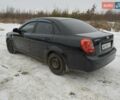 Черный Шевроле Лачетти, объемом двигателя 1.6 л и пробегом 263 тыс. км за 4500 $, фото 1 на Automoto.ua