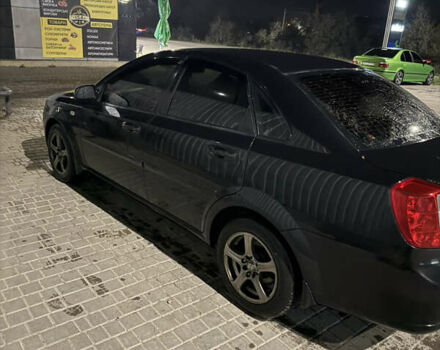 Черный Шевроле Лачетти, объемом двигателя 1.8 л и пробегом 296 тыс. км за 5300 $, фото 4 на Automoto.ua