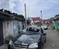 Черный Шевроле Лачетти, объемом двигателя 1.8 л и пробегом 300 тыс. км за 1000 $, фото 1 на Automoto.ua
