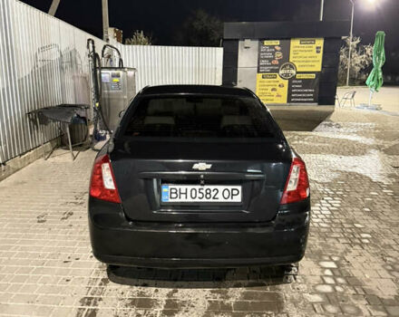 Черный Шевроле Лачетти, объемом двигателя 1.8 л и пробегом 296 тыс. км за 5300 $, фото 5 на Automoto.ua