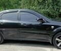 Черный Шевроле Лачетти, объемом двигателя 1.8 л и пробегом 190 тыс. км за 4999 $, фото 6 на Automoto.ua