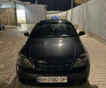 Черный Шевроле Лачетти, объемом двигателя 1.8 л и пробегом 296 тыс. км за 5300 $, фото 1 на Automoto.ua