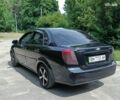 Черный Шевроле Лачетти, объемом двигателя 1.8 л и пробегом 190 тыс. км за 4999 $, фото 14 на Automoto.ua
