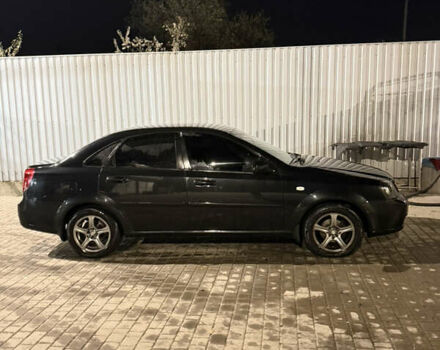 Черный Шевроле Лачетти, объемом двигателя 1.8 л и пробегом 296 тыс. км за 5300 $, фото 6 на Automoto.ua