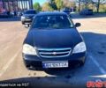 Черный Шевроле Лачетти, объемом двигателя 1.6 л и пробегом 303 тыс. км за 4000 $, фото 1 на Automoto.ua