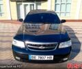 Черный Шевроле Лачетти, объемом двигателя 1.8 л и пробегом 279 тыс. км за 4599 $, фото 1 на Automoto.ua